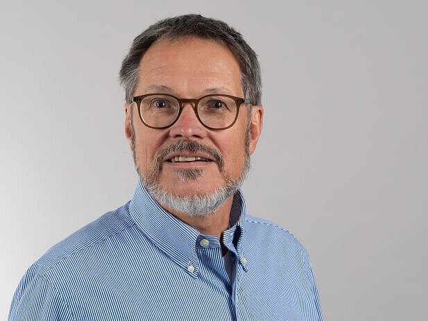 Mitarbeiter Gregor Feneberg